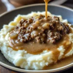 Delicious chicken chicken hamburger Gravy Over Mashed Potatoes