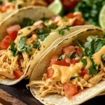 Slow Cooker Queso Chicken Tacos